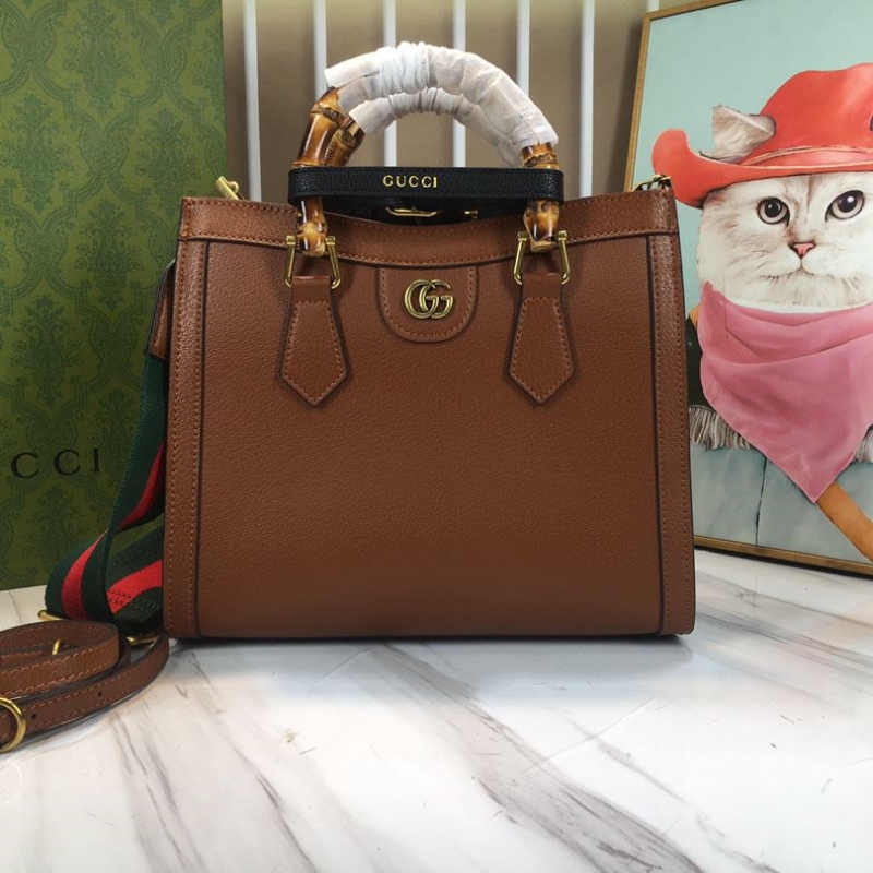 G*u*i shopping bags